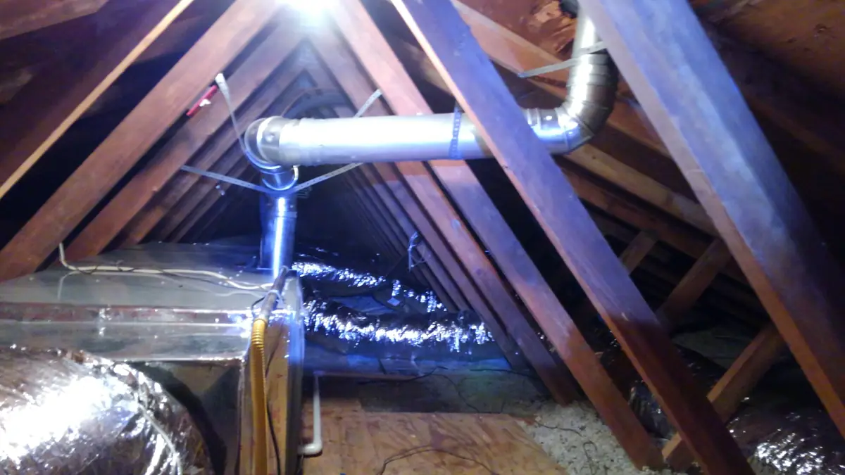 Insulated flexible ductwork installed in an attic by Ace Mechanical
